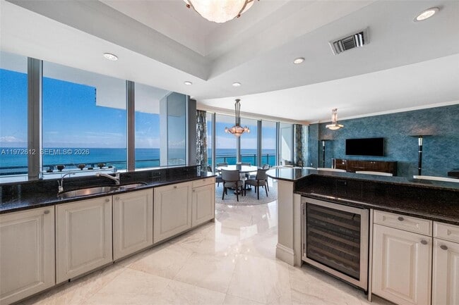 Building Photo - 10295 Collins Ave