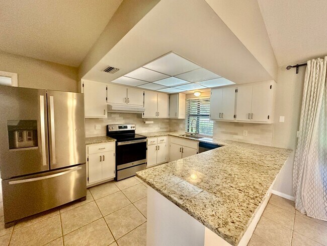 Building Photo - 3 Bedroom -2 Bath - Corner Fenced in Home ...