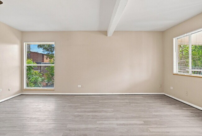 Building Photo - $1,645.95 with Half Off The First Month's Rent, 2 Beds - 1 Bath, Condo in Denver with Central A/C!