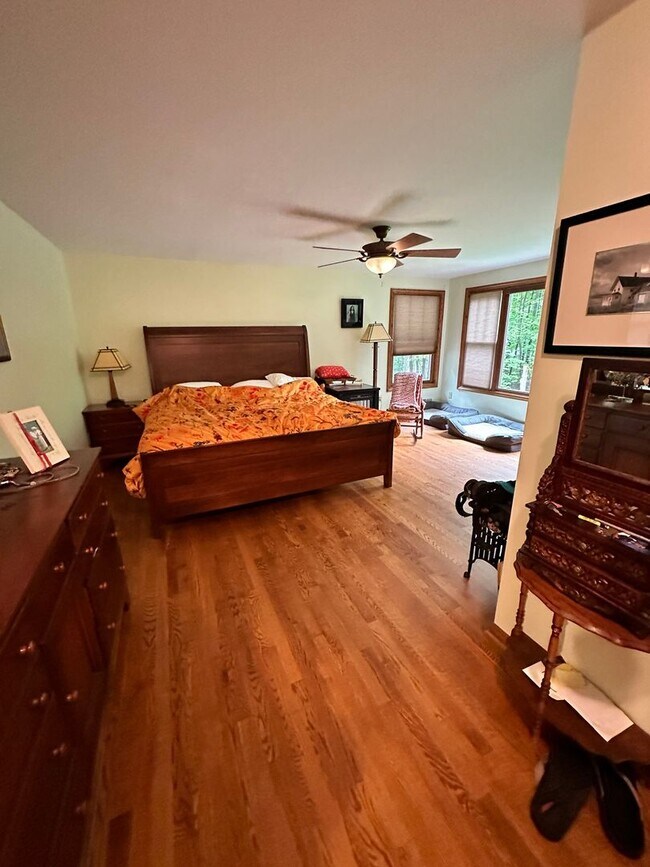 Building Photo - Dream Home in Highland, Michigan: Your Private Oasis on 5 Wooded Acres