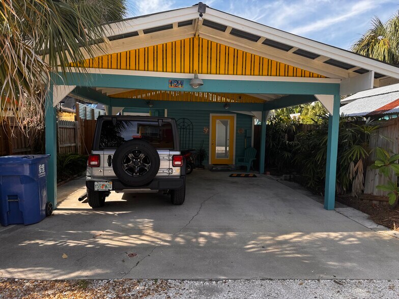 alley side carport with door to the studio - 124 19th Ave S