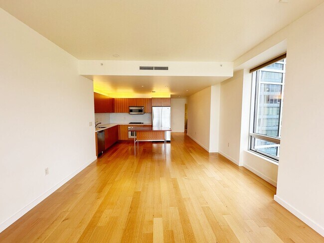 Building Photo - Spacious, open-concept 1-bedroom 7th floor condo in the South Waterfront District.