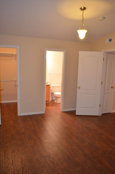 master bedroom with walkin closet, master bathroom and private porch. Recently painted white. - 1648 S Cole St