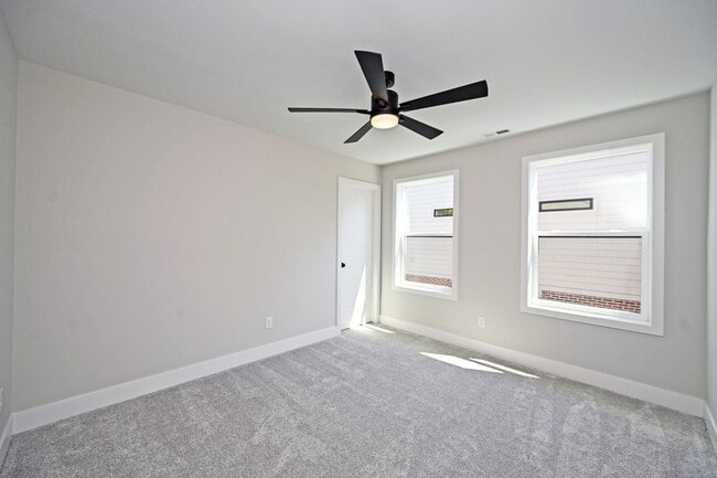Building Photo - Stylish, Sustainable & Low-Maintenance Liv...