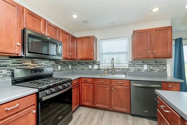 Building Photo - 4 Bedroom Home With Pond View in Top Rated...