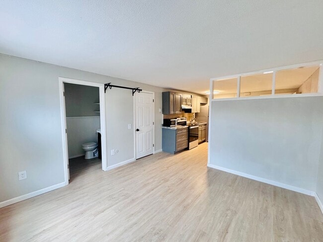 Building Photo - Price Improvement! $1500 Hot Water Included | Looking for the perfect studio in Dover with a pool...