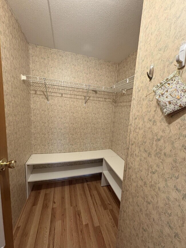 Building Photo - charming 3-bed, 2-bath home is located in the highly desired Strawberry Crest 55+ community