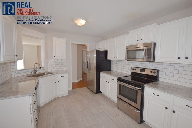 Building Photo - Gorgeous all-brick 4BD/2.5BA+Bonus room! Attached garage, bonus room AND loft!
