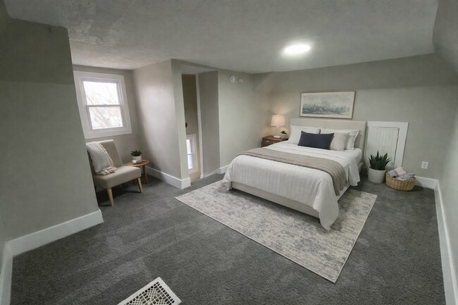Building Photo - More Space Than You’d Expect: Updated 3BR w/ 1.5 Baths + Carpeted Attic Bonus