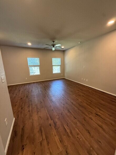 Fabulous open living area with loads of light and LVP flooring. - 5074 W Claxton Circle