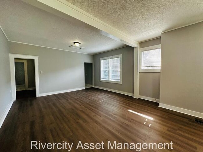 Building Photo - Move-In Ready! Stunning 4-Bedroom, 2-Bath ...
