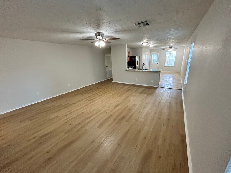 Living Room with Kitchen in Background - 16782 Fallen Timbers Dr