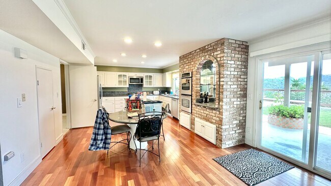 Building Photo - Spacious Two-Story Home with Three-Car Att...