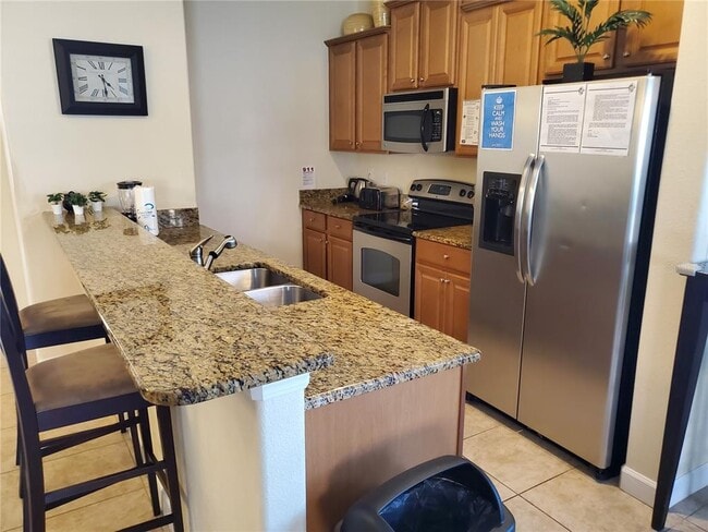 Building Photo - 8965 Cat Palm Rd