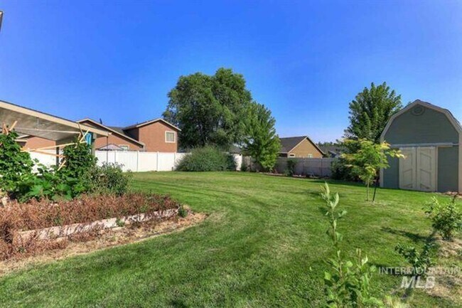 Building Photo - 4 Bedroom 2 Bath with RV Parking 2 Car Gar...