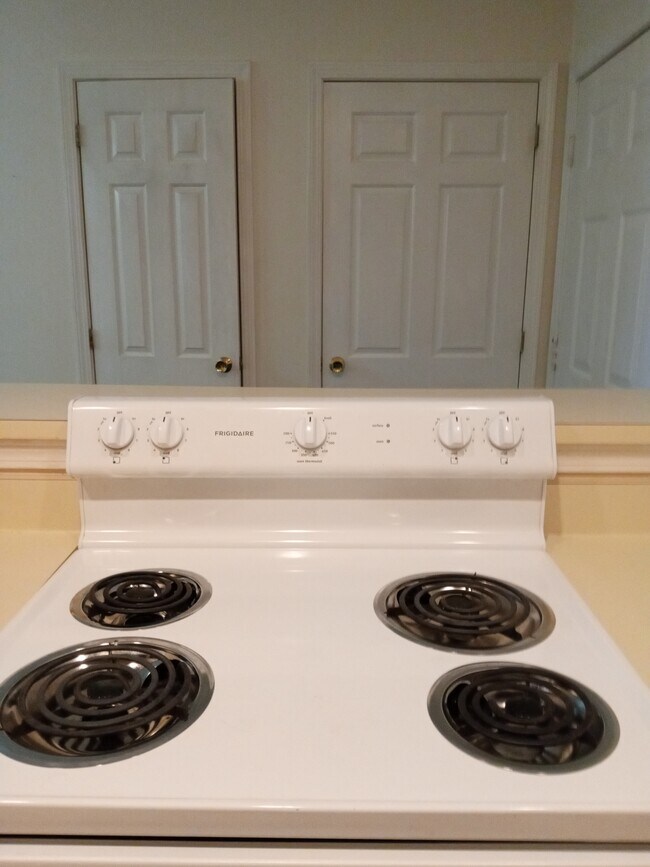 kitchen facing 2 closets - 28 Academy St