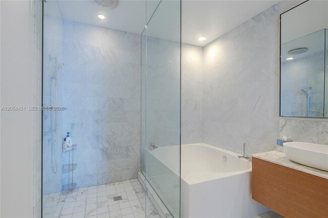 Building Photo - 10203 Collins Ave