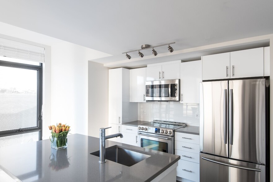 Interior Kitchen with White Cabinets and Prep Island - Berkshire 15