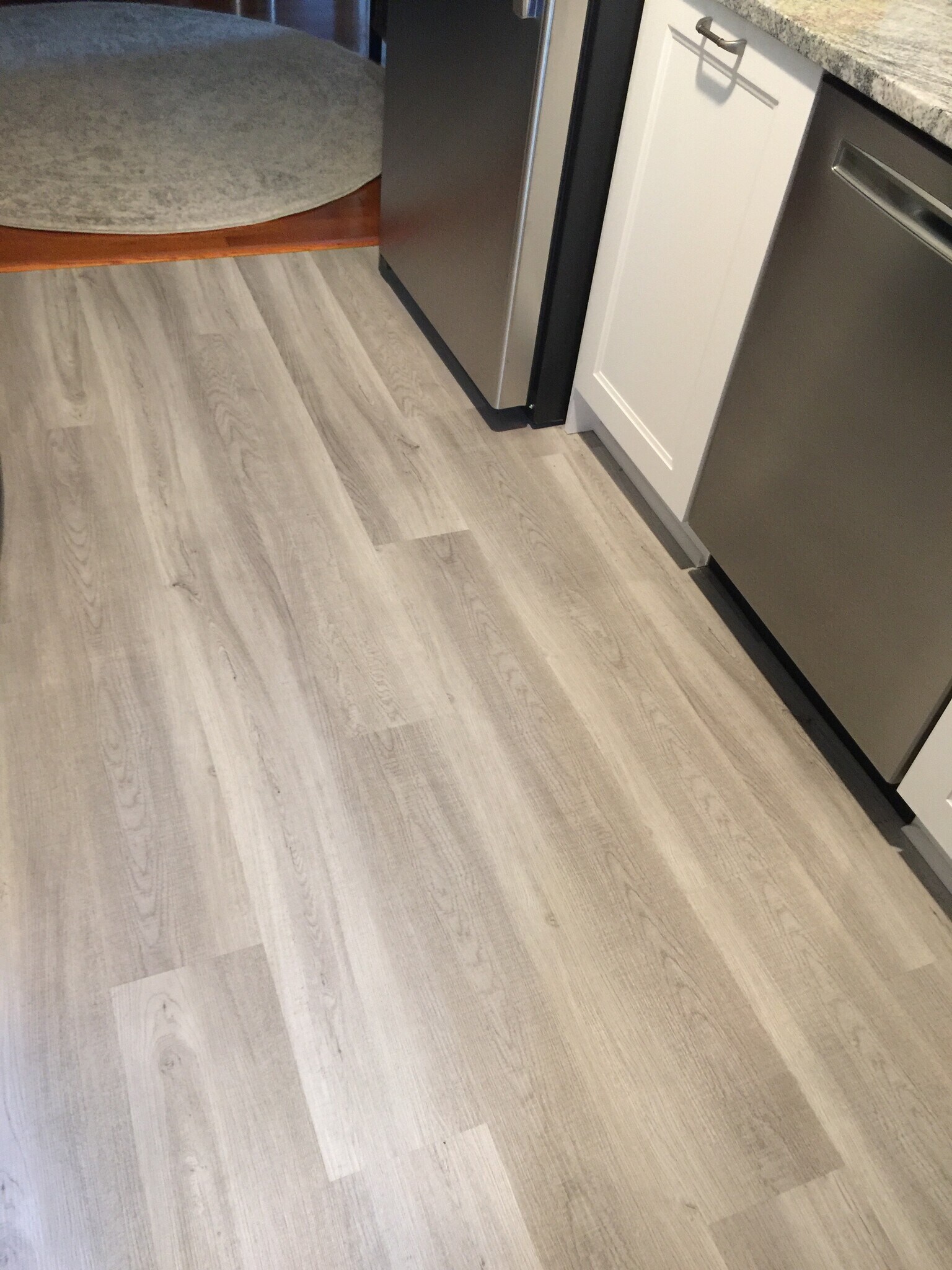 new gray laminate kitchen floor - 541 Lamar Ave