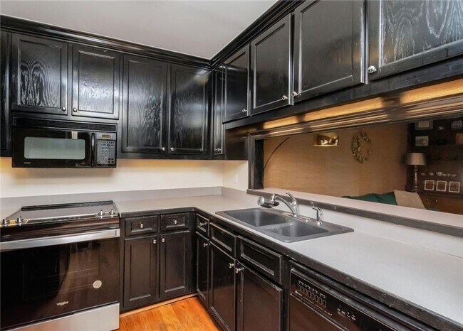 Building Photo - WELCOME TO GEORGETOWN CONDOMINIUMS IN SPRI...