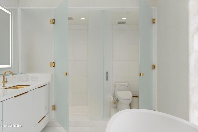 Building Photo - 6587 N Palmeraie Blvd