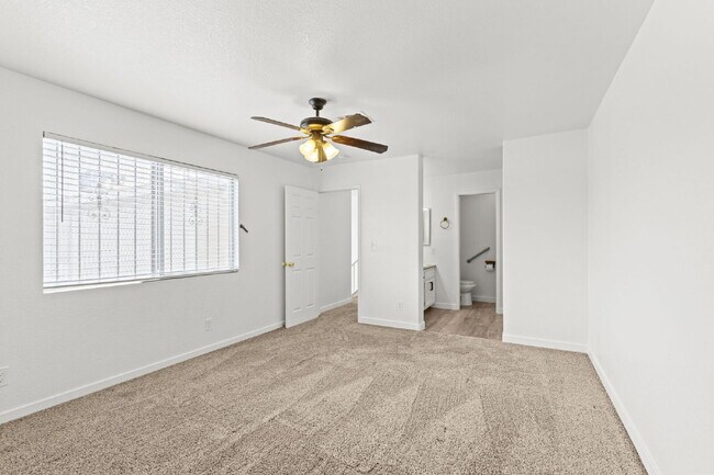 Building Photo - "Charming 3-Bedroom Townhouse Oasis with 2 Full Baths in Las Vegas – 1220 Sq Ft of Comfortable Li...