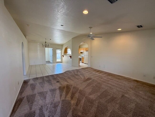 Building Photo - Occupied Do Not Disturb Tenant 3 Bedroom Plus Den & 2 Bath home Contact Property Pros Property Ma...