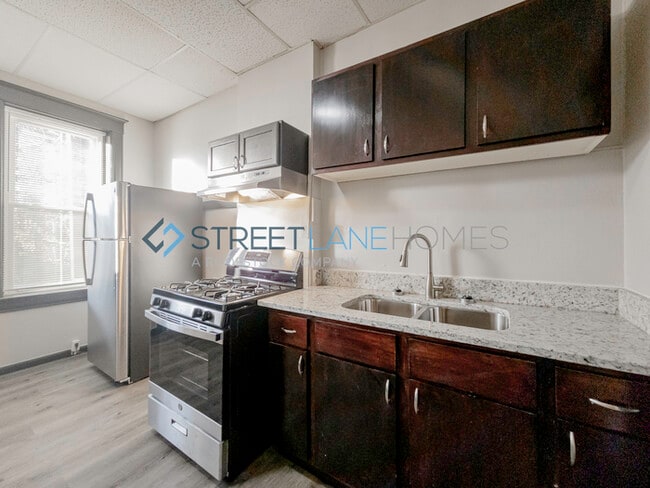 Building Photo - NOW OFFERING HALF OFF THE FIRST FULL MONTH...