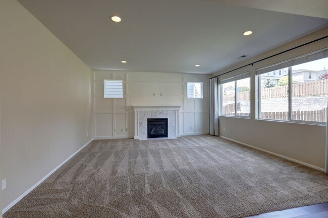 Building Photo - 4 Bedroom Home with Open Den, Living & Family Rooms – Space for Everyone