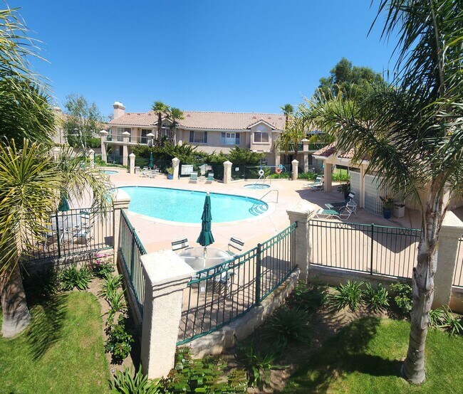 Building Photo - Gorgeous 2 bedroom newly renovated upstairs corner condo in gated community with pool & hill side...