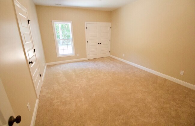Building Photo - "Brand New Construction."  Quiet location, charming, cozy 3 bedroom duplex