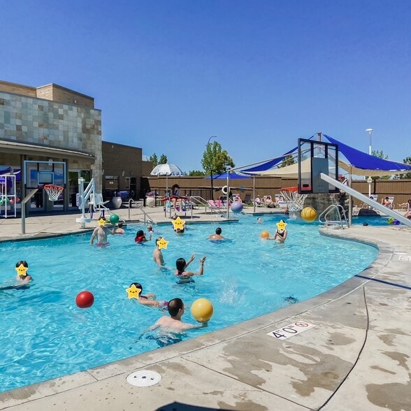 Example of Highlands Ranch Outdoor pool (They have 4) - 8415 Pebble Creek Way