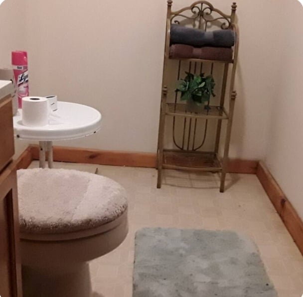 Lower level half bath. - 64 Meredith St