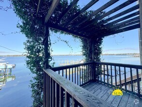 Building Photo - Waterfront Luxury Living on Garniers Bayou...