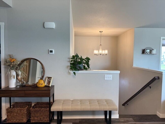 Building Photo - Spacious 4-Bed, 2-Bath Split-Level Townhome with Attached Heated Garage