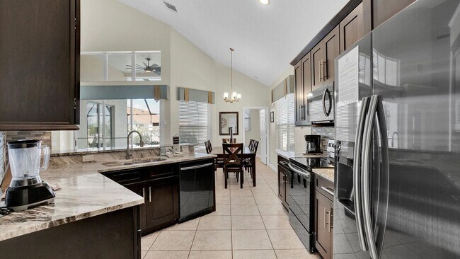 Building Photo - 8176 Fan Palm Way