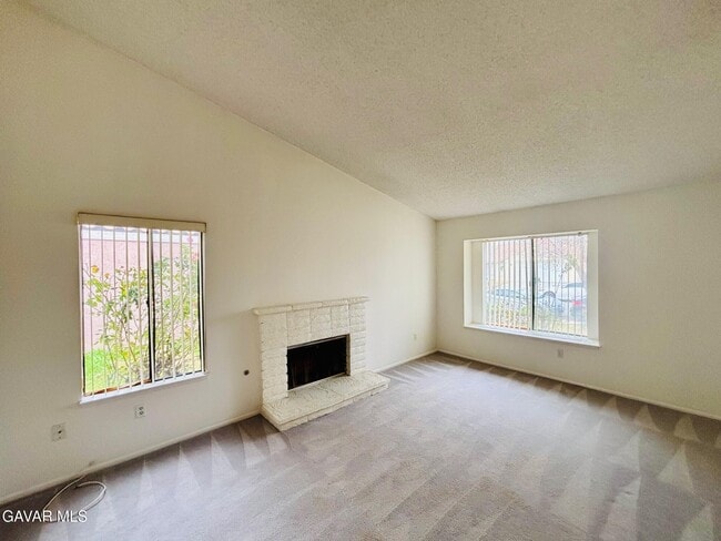 Building Photo - 3220 E Ave S2