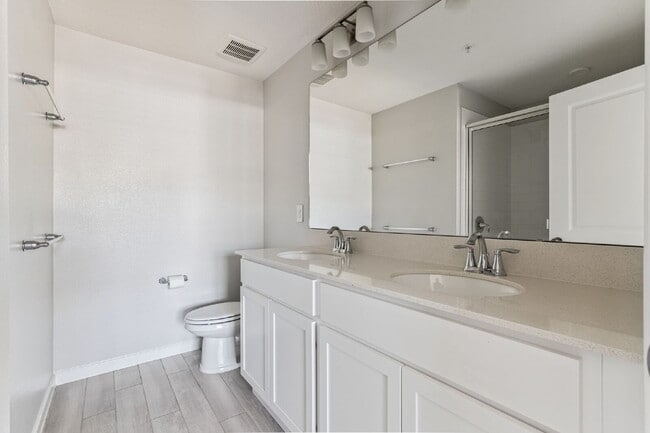 Building Photo - Stunning 3 bedroom, 2.5 bathroom townhome located in a highly desirable gated community