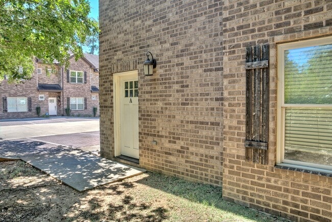 Building Photo - Heisman Villas: End Unit with Parking & Pr...