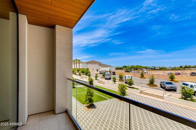Building Photo - 6587 N Palmeraie Blvd