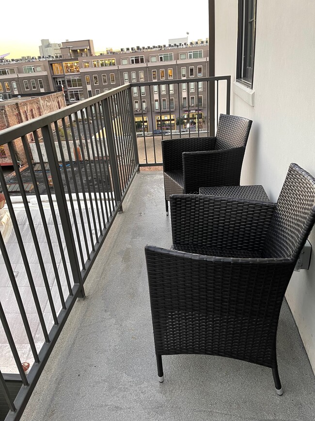 Private balcony with seating - 731 Saint Charles Ave