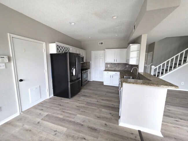 Building Photo - Spacious 4-Bedroom Home with Pool & Spa in...