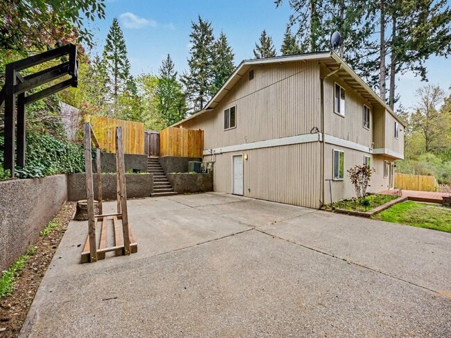 Building Photo - Spacious 4-Bedroom Lacey Home with A/C, Basement Bonus Space & Wetlands Privacy