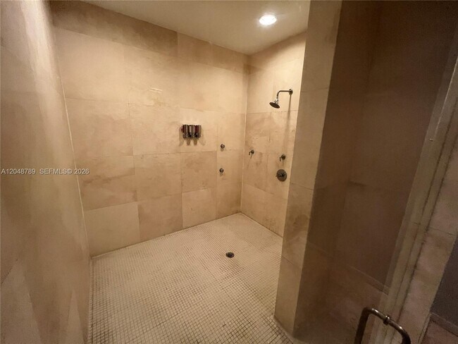 Building Photo - 10275 Collins Ave