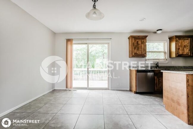 Building Photo - 411 Wiltshire Dr, Raymore, MO 64083