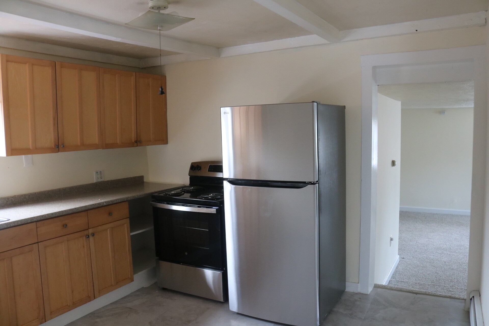 Kitchen with new stainless steel appliances - 333 Groveland St