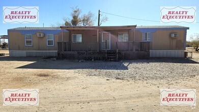 Building Photo - Avra Valley 2/2 with A/C and a yard