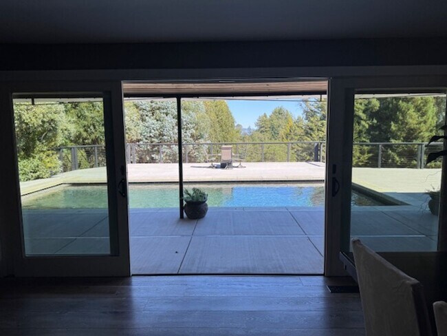 Building Photo - Stunning Deck and Pool for this Updated Mi...