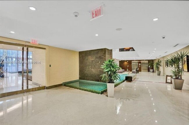 Building Photo - 18201 Collins Ave