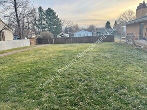 Building Photo - Semi-Furnished 5 bed 2 bath with large fenced yard for rent!